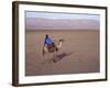 Man in Traditional Dress Riding Camel, Morocco-Merrill Images-Framed Photographic Print