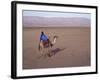 Man in Traditional Dress Riding Camel, Morocco-Merrill Images-Framed Photographic Print