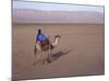 Man in Traditional Dress Riding Camel, Morocco-Merrill Images-Mounted Photographic Print