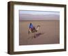 Man in Traditional Dress Riding Camel, Morocco-Merrill Images-Framed Photographic Print