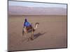 Man in Traditional Dress Riding Camel, Morocco-Merrill Images-Mounted Photographic Print