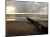 Man Jogs by the Beach Towards the Wall Dividing Mexico and the U.S. in Tijuana, Mexico-null-Mounted Photographic Print