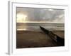 Man Jogs by the Beach Towards the Wall Dividing Mexico and the U.S. in Tijuana, Mexico-null-Framed Photographic Print