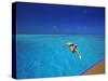 Man Jumping into Tropical Sea from Deck, Maldives, Indian Ocean-Papadopoulos Sakis-Stretched Canvas