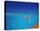 Man Jumping into Tropical Sea from Deck, Maldives, Indian Ocean-Papadopoulos Sakis-Stretched Canvas