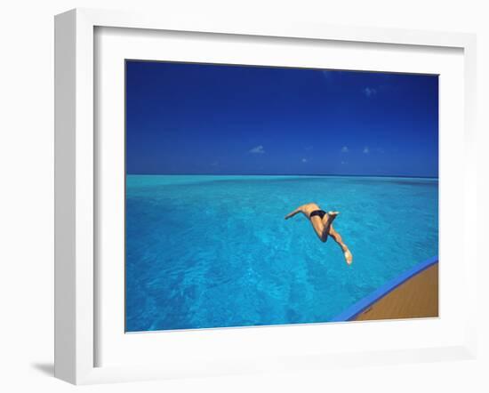 Man Jumping into Tropical Sea from Deck, Maldives, Indian Ocean-Papadopoulos Sakis-Framed Photographic Print