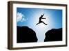 Man Jumping over Precipice between Two Rocky Mountains at Sun Light. Freedom, Risk, Challenge, Succ-Michal Bednarek-Framed Photographic Print