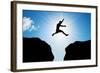 Man Jumping over Precipice between Two Rocky Mountains at Sun Light. Freedom, Risk, Challenge, Succ-Michal Bednarek-Framed Photographic Print