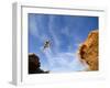 Man Jumps Gap at Red Bull Rampage Site, Virgin, Utah, USA-Chuck Haney-Framed Photographic Print