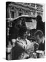 Man Kissing Woman's Hand at the Cafe de La Place de L'Opera-Loomis Dean-Stretched Canvas