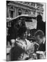 Man Kissing Woman's Hand at the Cafe de La Place de L'Opera-Loomis Dean-Mounted Photographic Print