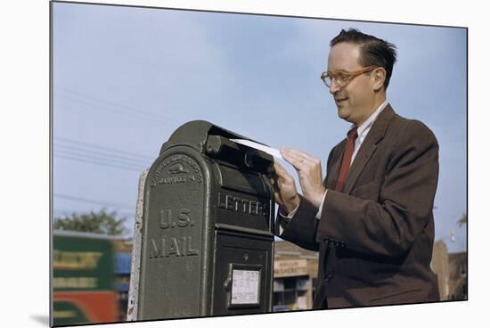 Man Mailing a Letter-William P. Gottlieb-Mounted Photographic Print