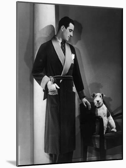 Man Models a Jersey Wool Dressing Gown, and His Wire Haired Fox Terrier Poses for the Camera-null-Mounted Art Print