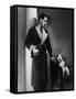 Man Models a Wool Jersey Dressing Gown and His Wire- Haired Fox Terrier Poses for the Camera-null-Framed Stretched Canvas