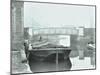 Man Mooring a Barge by a River Bank, Poplar, London, 1905-null-Mounted Premium Photographic Print