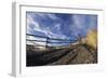 Man Mountain Biking on Countryside Path against Fence and Sky-Nosnibor137-Framed Photographic Print