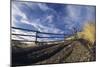 Man Mountain Biking on Countryside Path against Fence and Sky-Nosnibor137-Mounted Photographic Print