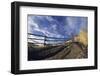 Man Mountain Biking on Countryside Path against Fence and Sky-Nosnibor137-Framed Photographic Print