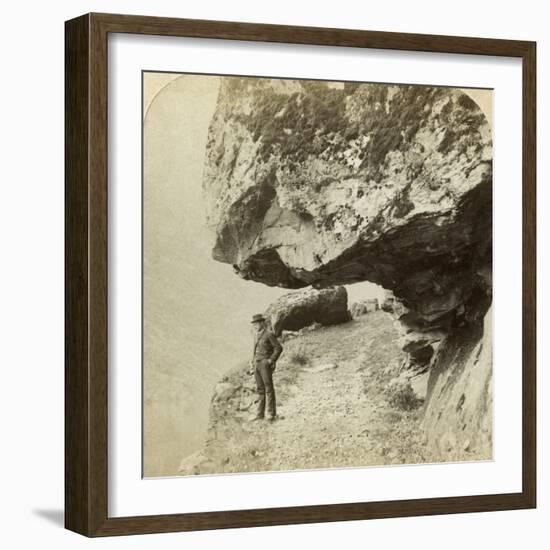 Man on a Cliff Overlooking Naeroyfjord, Sogne, Norway-Bert Underwood-Framed Photographic Print