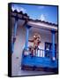 Man on Balcony Rail During Village Festival, Chinceros, Peru-Jim Zuckerman-Framed Stretched Canvas