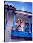 Man on Balcony Rail During Village Festival, Chinceros, Peru-Jim Zuckerman-Stretched Canvas