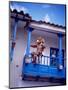 Man on Balcony Rail During Village Festival, Chinceros, Peru-Jim Zuckerman-Mounted Premium Photographic Print