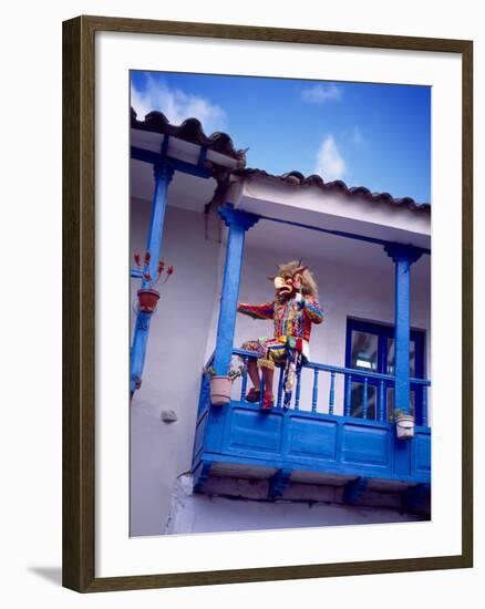 Man on Balcony Rail During Village Festival, Chinceros, Peru-Jim Zuckerman-Framed Photographic Print