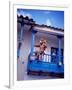 Man on Balcony Rail During Village Festival, Chinceros, Peru-Jim Zuckerman-Framed Photographic Print