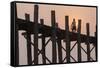 Man on Bicycle Silhouetted at Sunrise Crossing Taungthaman Lake on U Bein Teak Bridge at Dawn-Stephen Studd-Framed Stretched Canvas