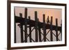 Man on Bicycle Silhouetted at Sunrise Crossing Taungthaman Lake on U Bein Teak Bridge at Dawn-Stephen Studd-Framed Photographic Print