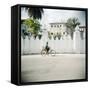 Man on Bicycle with Old Buildings Behind, Stone Town, Zanzibar, Tanzania, East Africa, Africa-Lee Frost-Framed Stretched Canvas