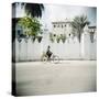 Man on Bicycle with Old Buildings Behind, Stone Town, Zanzibar, Tanzania, East Africa, Africa-Lee Frost-Stretched Canvas