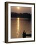 Man on Boat on River Near Dr. Albert Schweitzer's Compound at Lambarene-George Silk-Framed Photographic Print