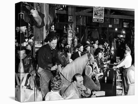 Man on horse In Bar During Reenactment of Killing in James Butler "Wild Bill" Hickok by Jack McCall-Alfred Eisenstaedt-Stretched Canvas