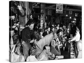 Man on horse In Bar During Reenactment of Killing in James Butler "Wild Bill" Hickok by Jack McCall-Alfred Eisenstaedt-Stretched Canvas