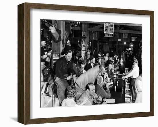 Man on horse In Bar During Reenactment of Killing in James Butler "Wild Bill" Hickok by Jack McCall-Alfred Eisenstaedt-Framed Photographic Print