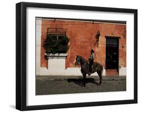 Man on Horse in Front of a Typical Painted Wall, Antigua, Guatemala, Central America-Upperhall-Framed Photographic Print