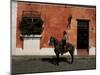 Man on Horse in Front of a Typical Painted Wall, Antigua, Guatemala, Central America-Upperhall-Mounted Photographic Print