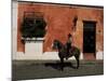 Man on Horse in Front of a Typical Painted Wall, Antigua, Guatemala, Central America-Upperhall-Mounted Photographic Print