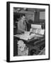 Man Operating Printing Press on Queen Elizabeth-Ed Clark-Framed Photographic Print