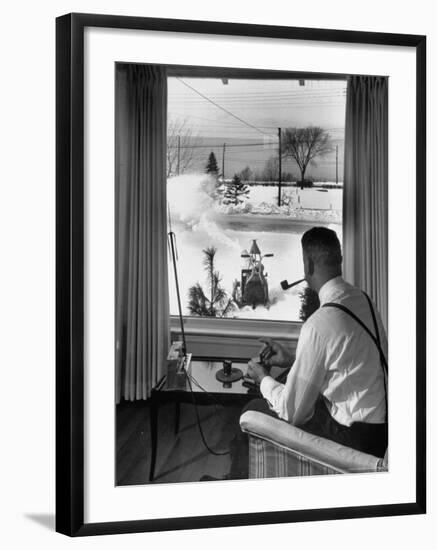 Man Operating Remote Control Snow Plow-Joe Scherschel-Framed Photographic Print