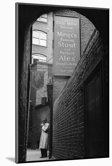 Man outside Ye Olde Mitre Tavern-Philip Gendreau-Mounted Photographic Print