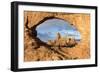 Man overlooking Turret Arch from North Window. Arches National Park, Moab, Grand County, Utah, USA.-ClickAlps-Framed Photographic Print