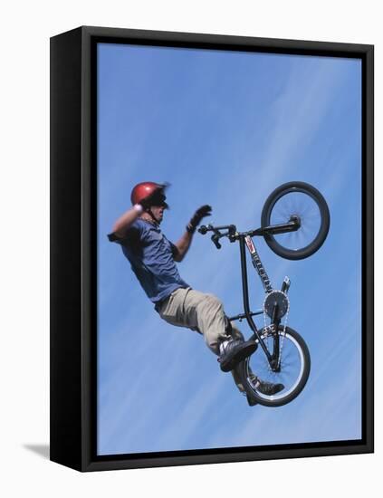 Man Performing Trick on a Bicycle-null-Framed Stretched Canvas