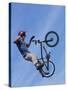 Man Performing Trick on a Bicycle-null-Stretched Canvas