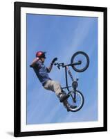 Man Performing Trick on a Bicycle-null-Framed Photographic Print