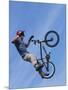 Man Performing Trick on a Bicycle-null-Mounted Photographic Print