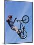 Man Performing Trick on a Bicycle-null-Mounted Photographic Print