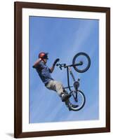 Man Performing Trick on a Bicycle-null-Framed Photographic Print