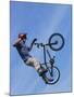 Man Performing Trick on a Bicycle-null-Mounted Photographic Print